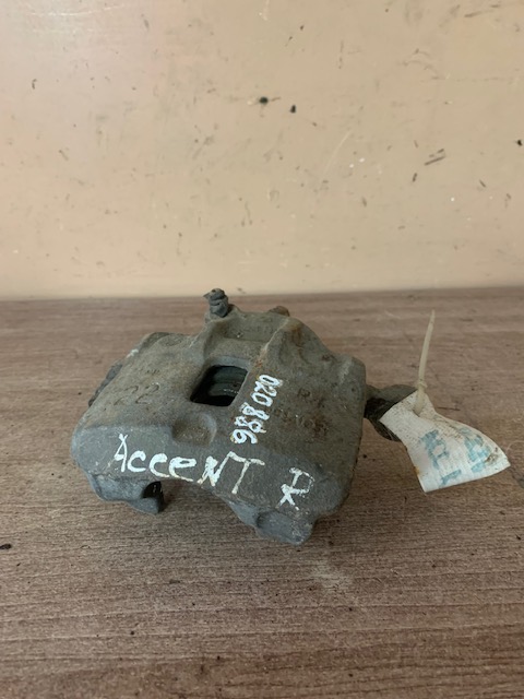 Hyundai Accent 2000- (+ ТАГАЗ) Суппорт передний правый для Hyundai Accent 2000>, Getz 2002-2010, Accent 1994-2000; (без скобы) (5813025100)