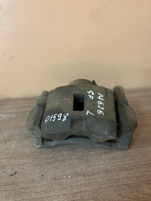 Mazda 626 (GF) Суппорт тормозной передний левый для Mazda 626 (GF) 1997-2002   gb6h3399za цена за супорт без скобы!