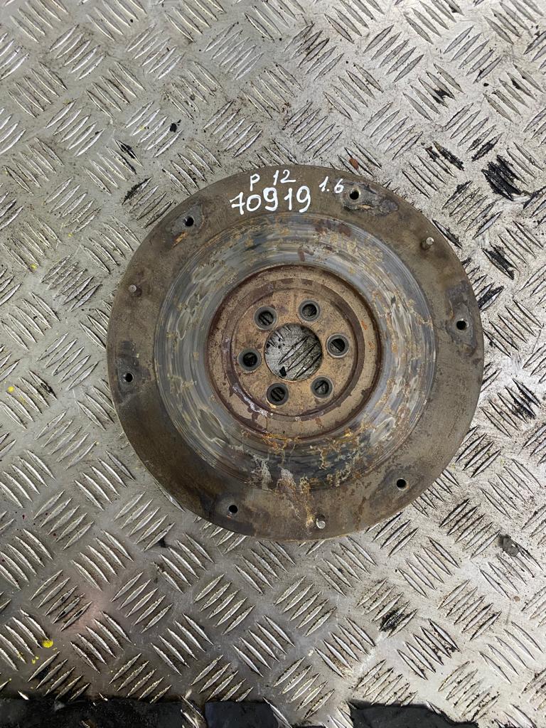 Nissan Primera P12 (2002-2007) Маховик NISSAN PRIMERA P12E (2002>) (QG16DE) 123119F600