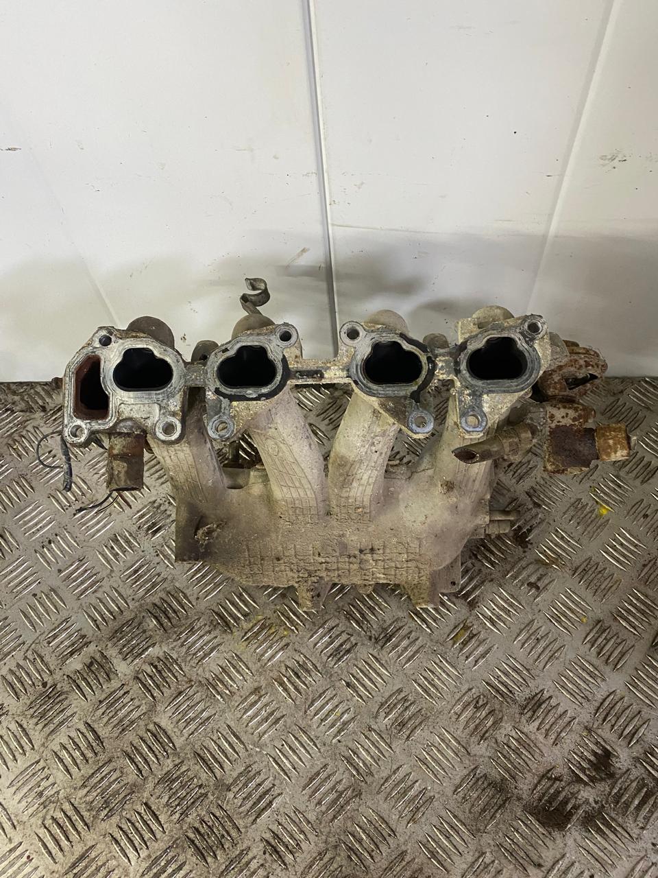 Nissan Almera N15 Коллектор впускной NISSAN ALMERA N15 (1995-2000) (1.4/1.6) 14001-73C10 Nissan