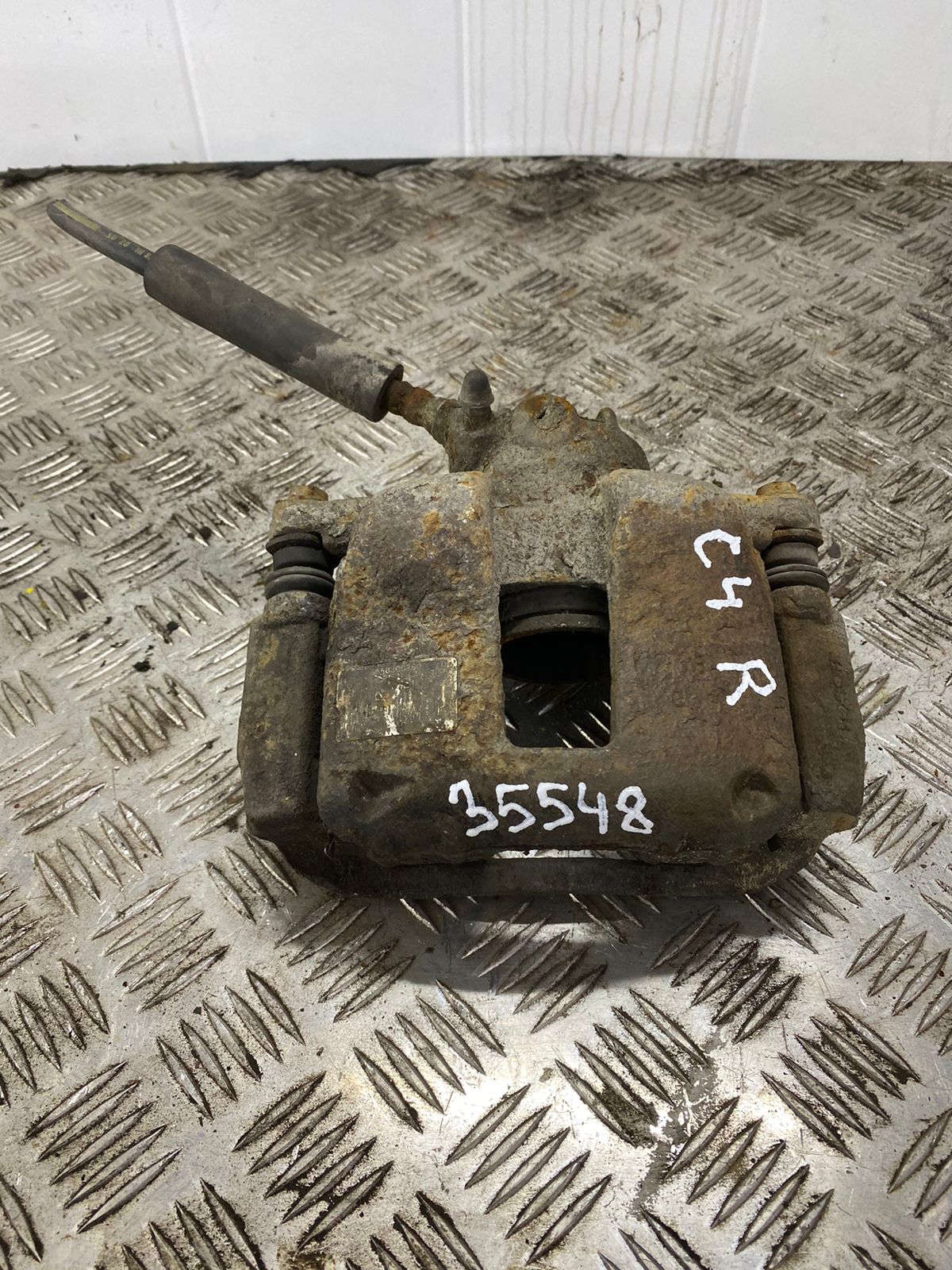 Citroen C4 2005-2011 Суппорт тормозной передний правый C4 2005-2011;307 2001-2008;Xsara Picasso 1999-2010;Berlingo(FIRST) (M59) 2002-2012;Partner (M59) 2002-2012 (4400N3)