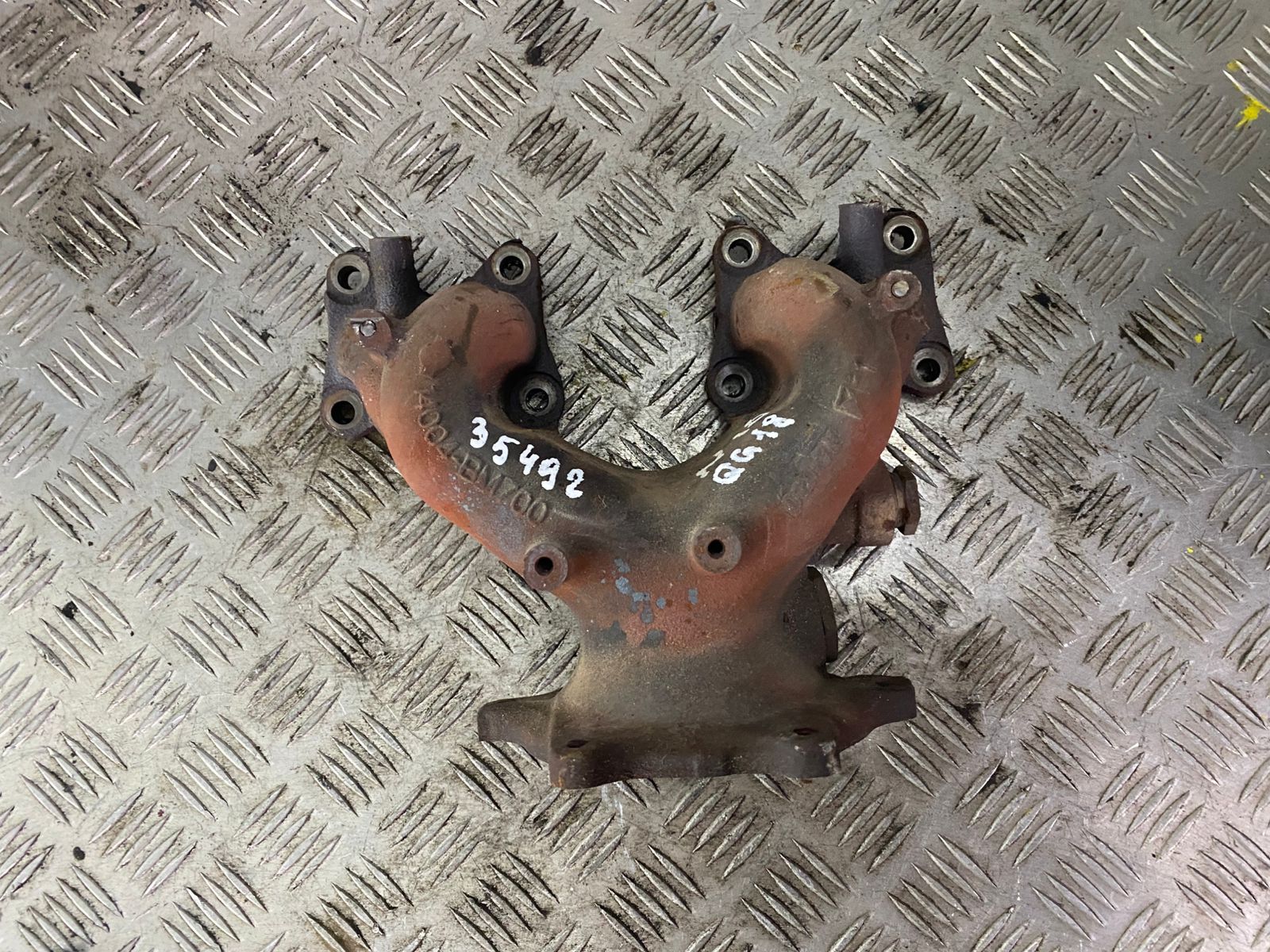 Nissan Almera N16 Коллектор выпускной Nissan Almera N16 2000-2006; Primera P11 1996-2002  14002BM700