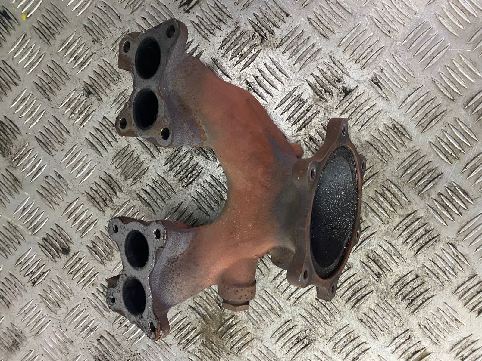 Nissan Almera N16 Коллектор выпускной Nissan Almera N16 2000-2006; Primera P11 1996-2002  14002BM700