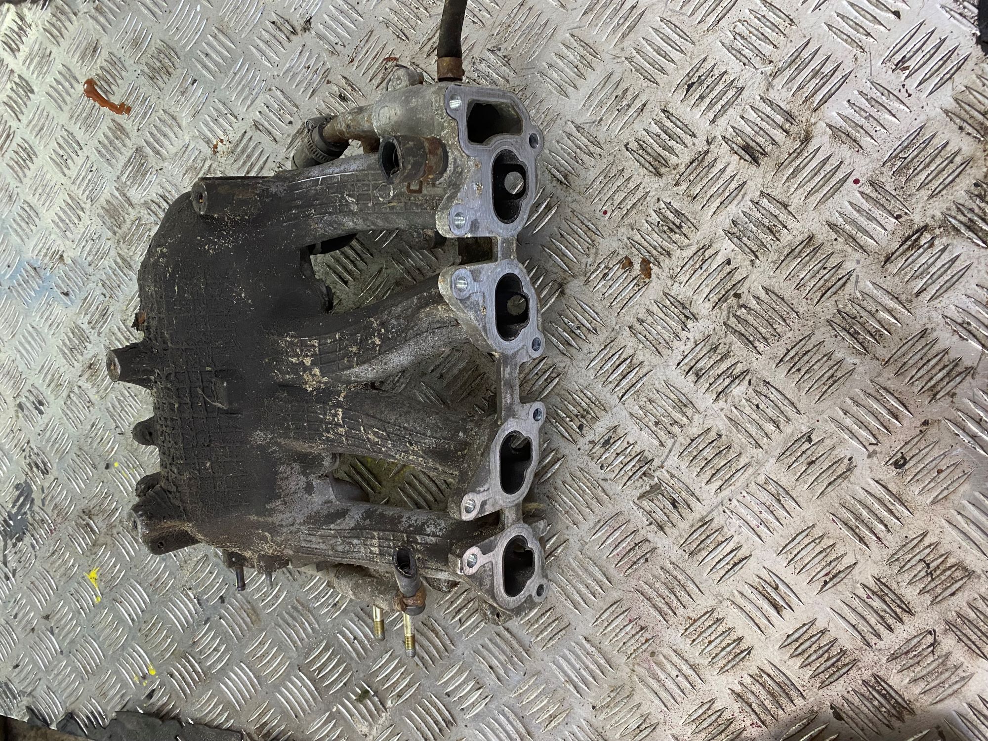 Nissan Almera N15 Коллектор впускной NISSAN ALMERA N15 (1995-2000) (1.4/1.6) 1400173C10