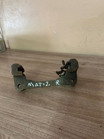Daewoo Matiz Скоба суппорта переднего  для Daewoo Matiz 2001> 963165801